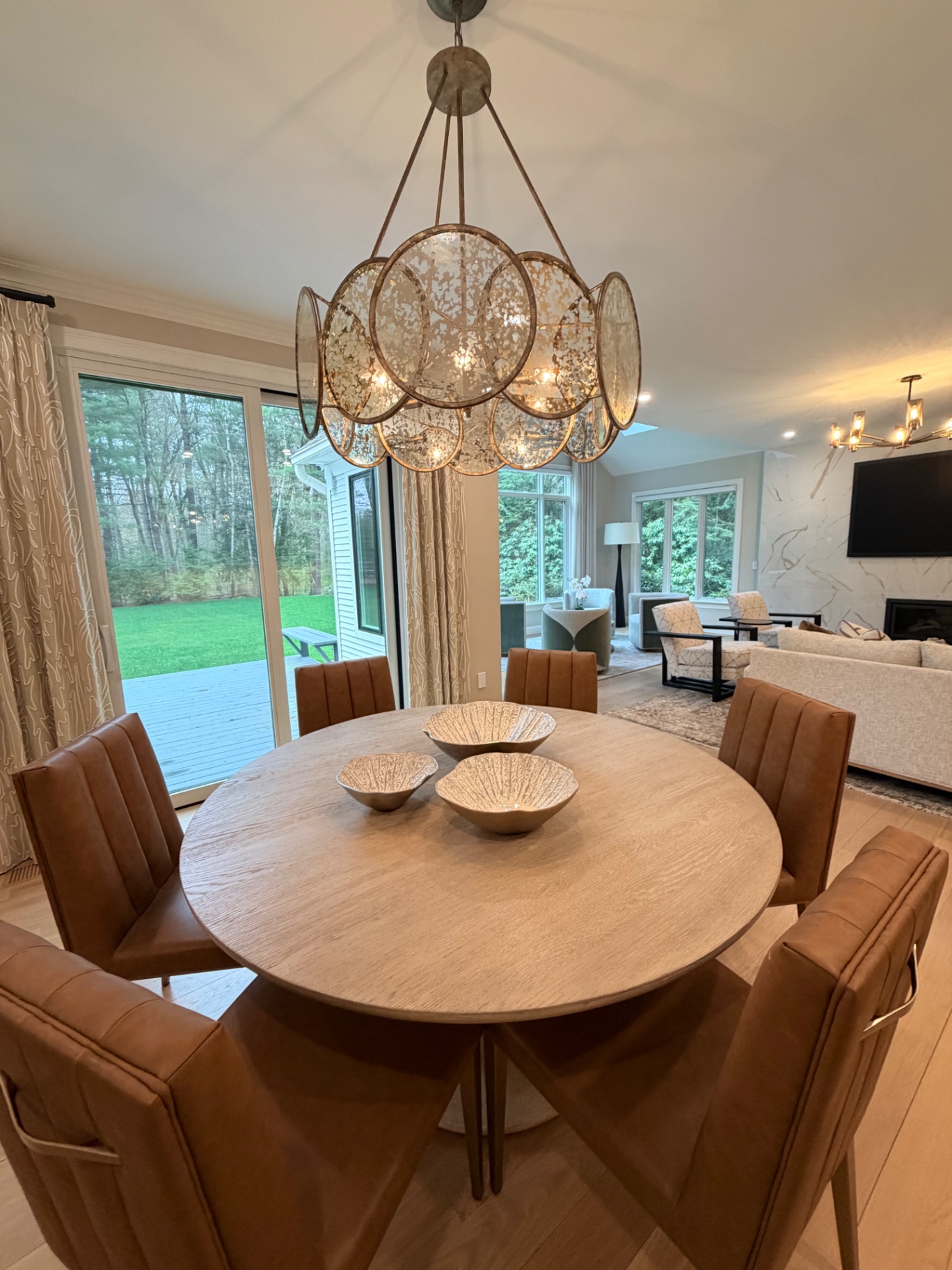 Elegant round dining table with chandelier