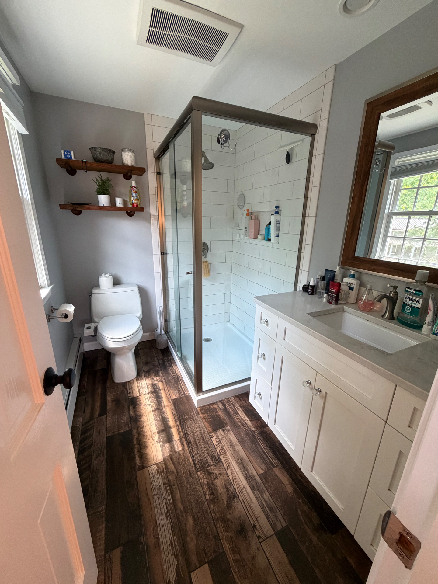 Freshly cleaned bathroom with glass shower
